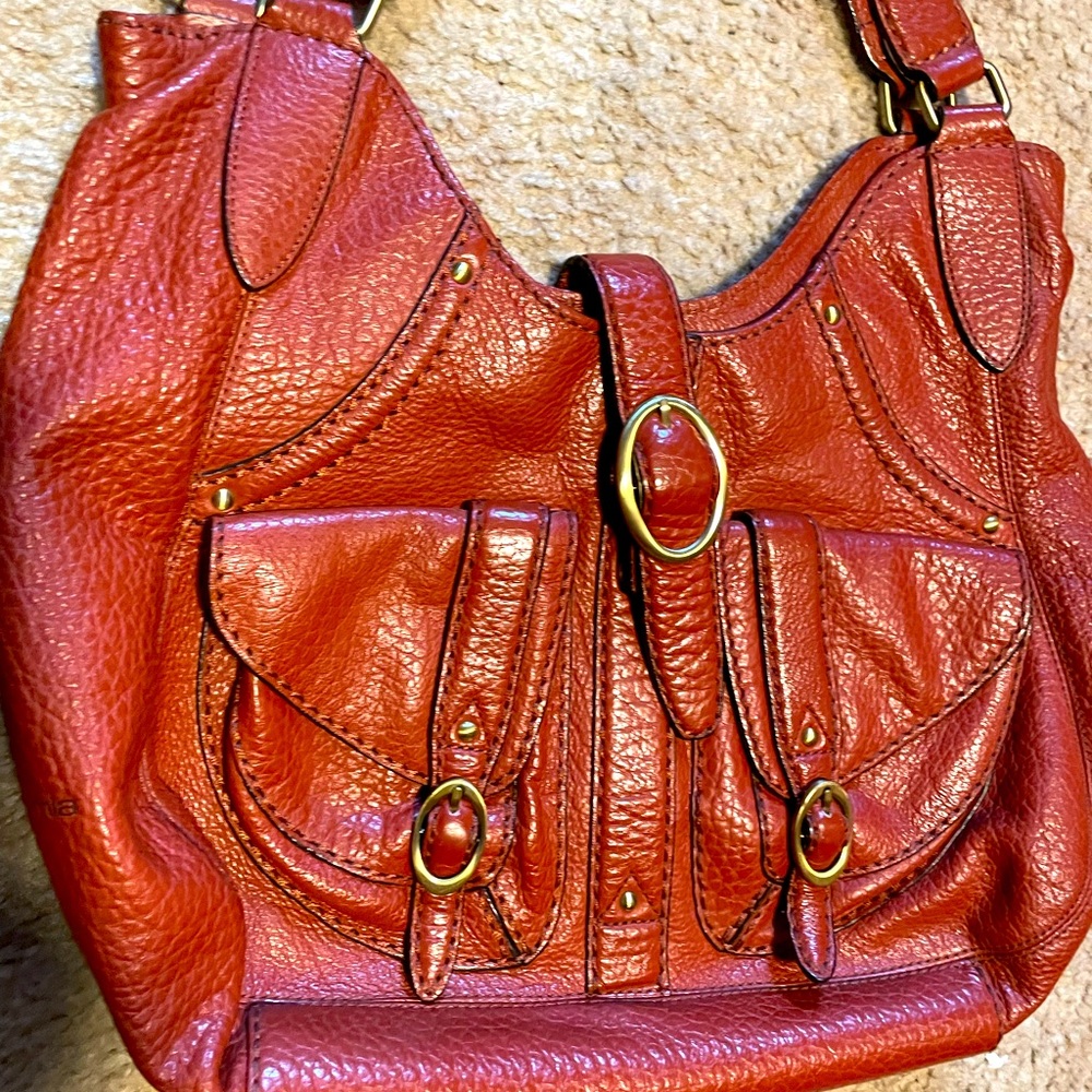 A woman's all leather hand bag.  By Cromia designer. Italian leather.